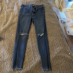 High-rise jeggings, size: 2. Holes in knees (style).